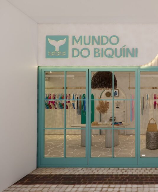 Fachada da loja Mundo do Biquíni em Ipanema com o letreiro completo — render do projeto Unpack Design